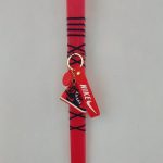 Πασχαλινή Λαμπάδα κόκκινη με μπρελόκ με κόκκινο παπούτσι "NIKE"